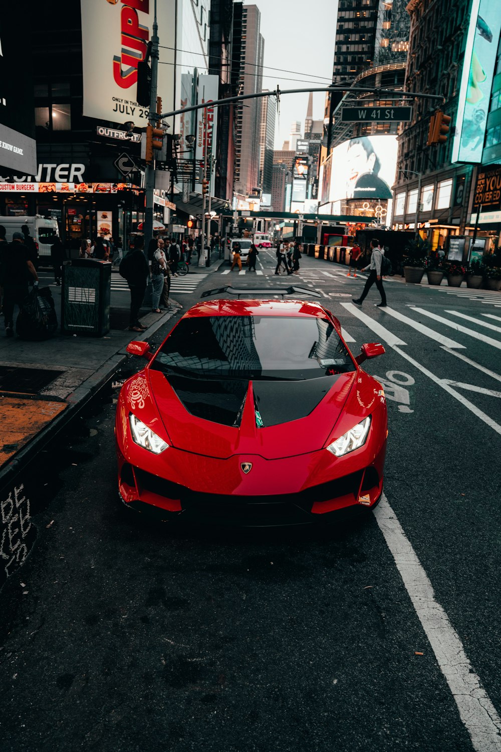 a red sports car on a street