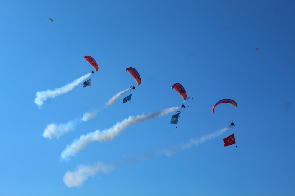 a group of people parachuting