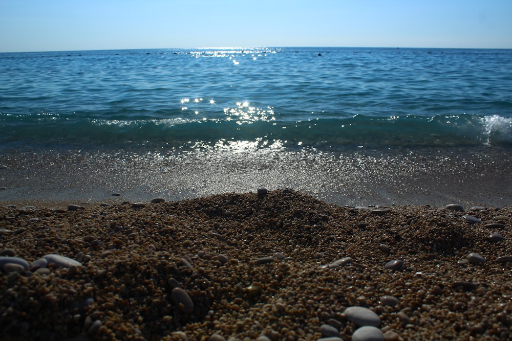 a rocky beach with waves crashing