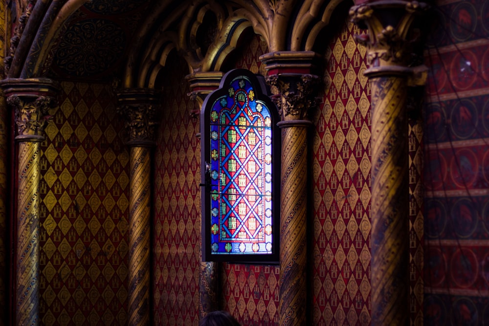 a colorful wall with a window