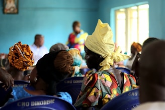 a group of people sitting in a room