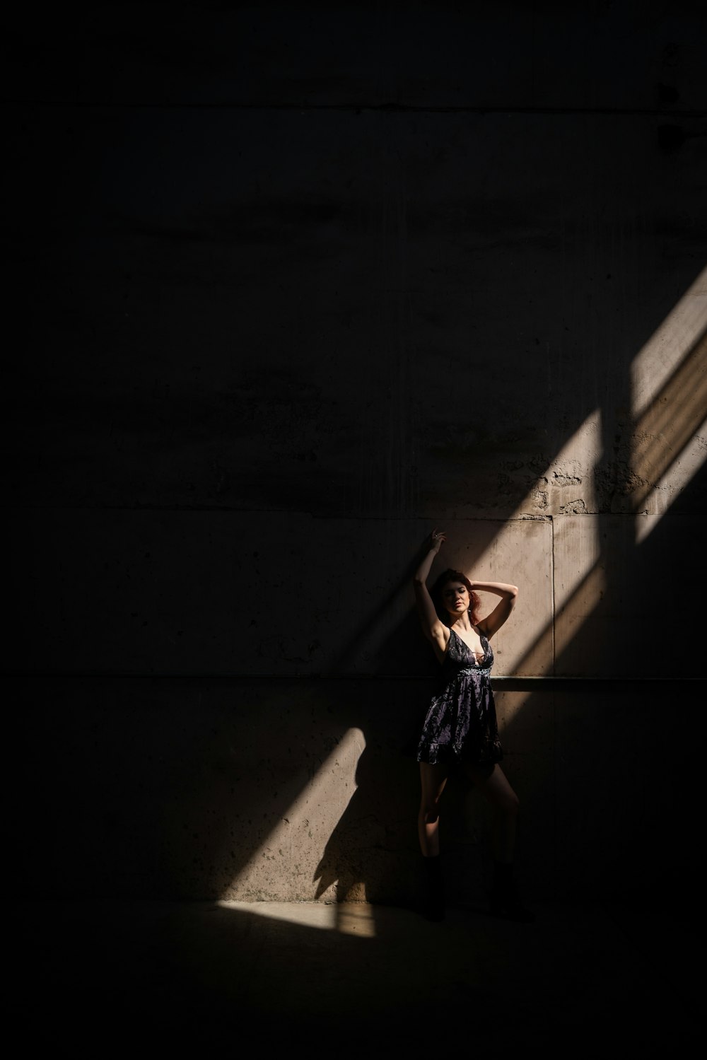 a person standing in a dark room