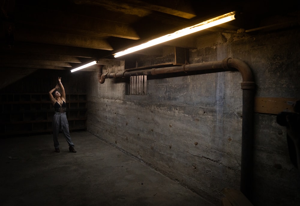 a man standing in a dark room