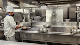 a chef cooking in a kitchen