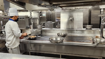 a chef cooking in a kitchen