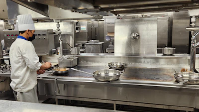 a chef cooking in a kitchen