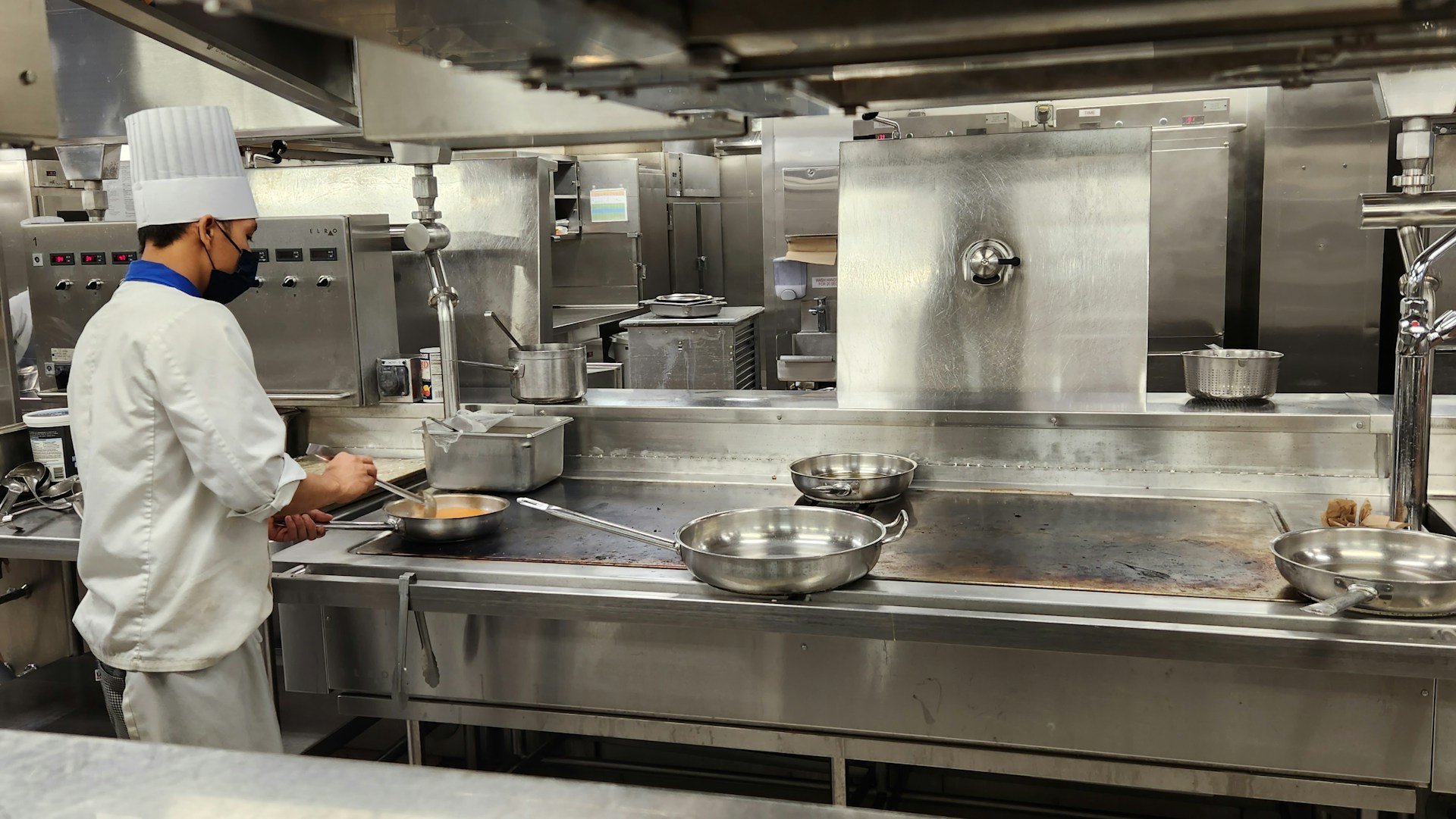 a chef cooking in a kitchen
