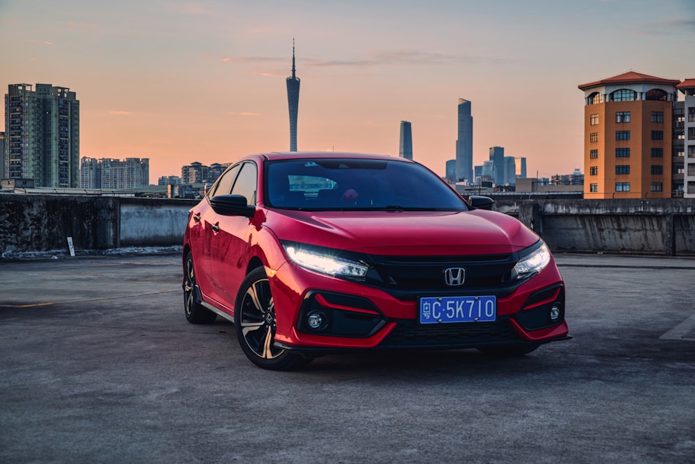 a red car parked on a road