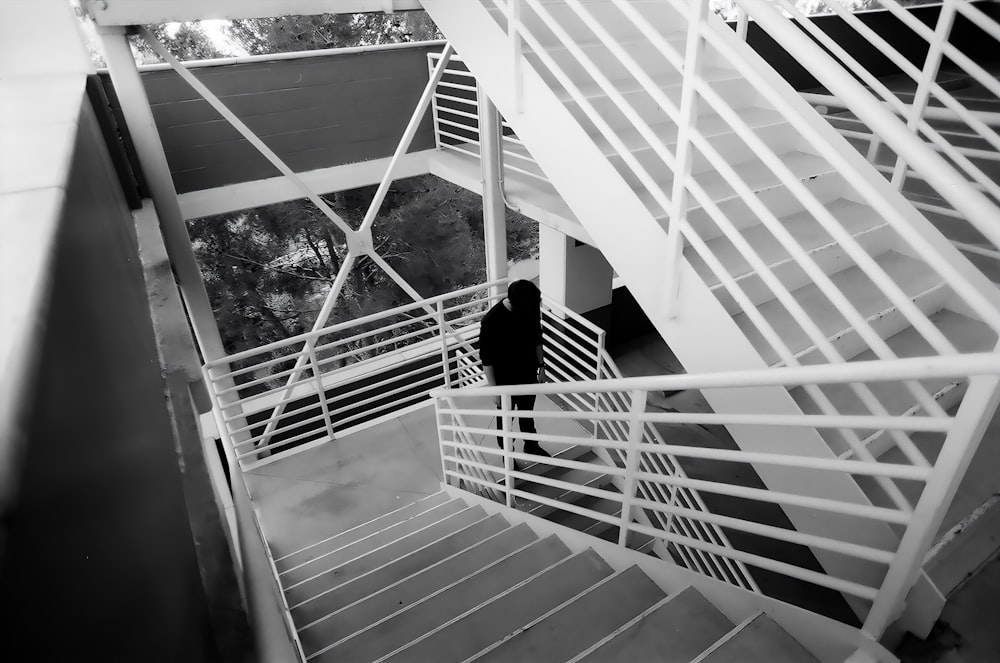 a person walking up a flight of stairs