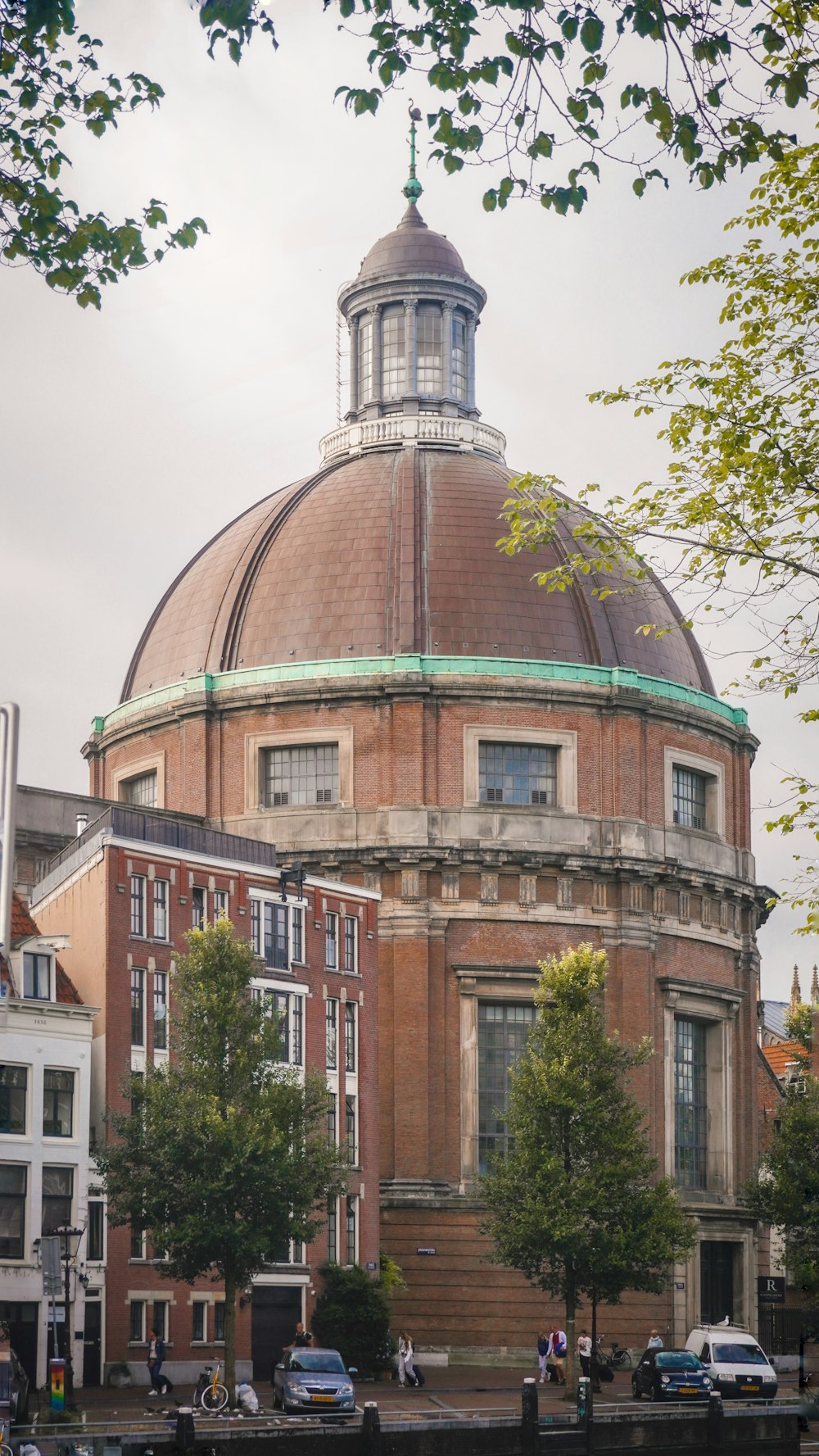 a large brick building with a dome