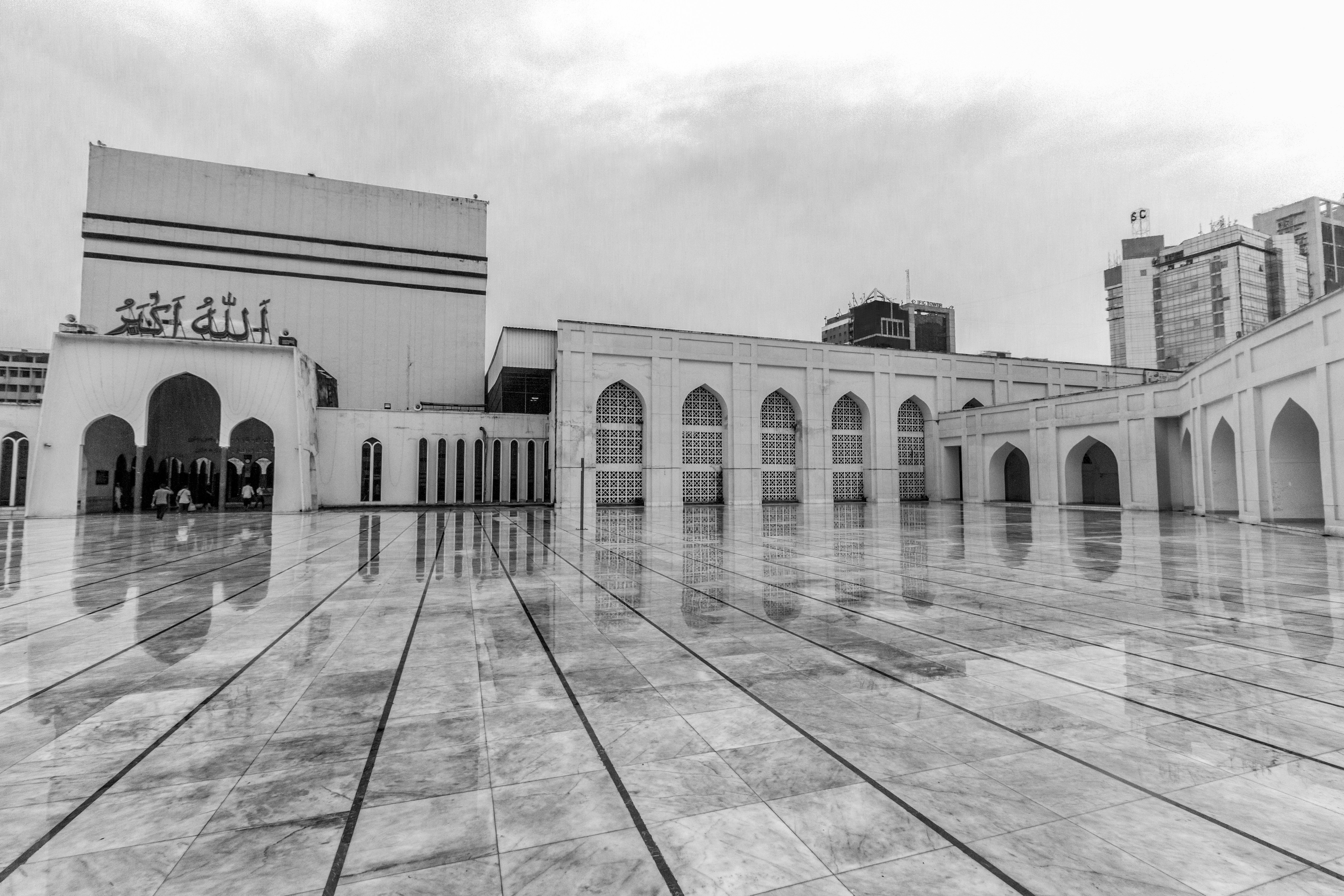 A black and white photo of a large building