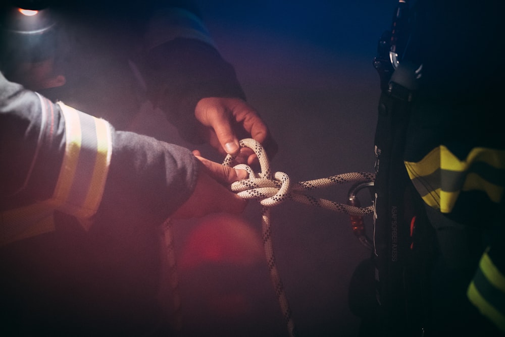 a person holding a rope