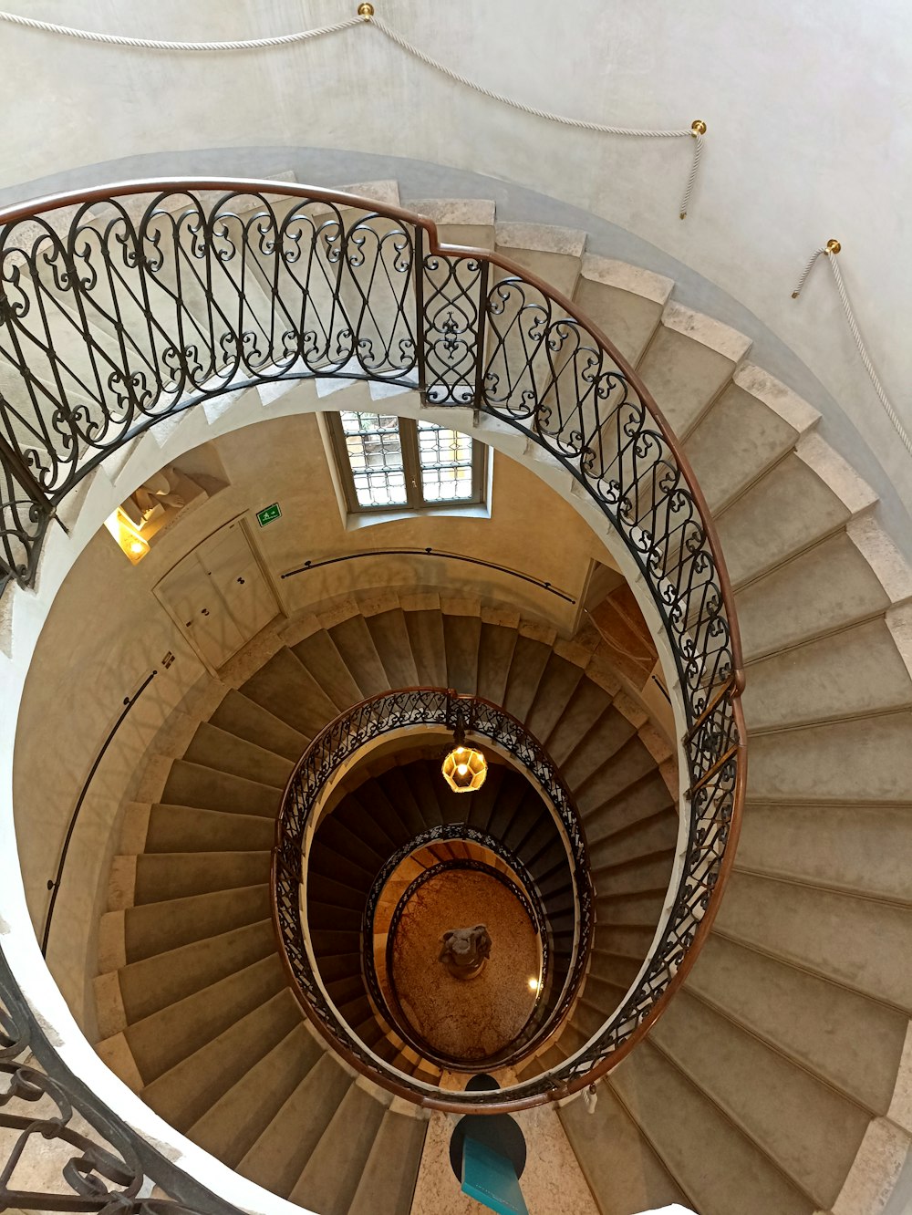 a spiral staircase with a spiral staircase