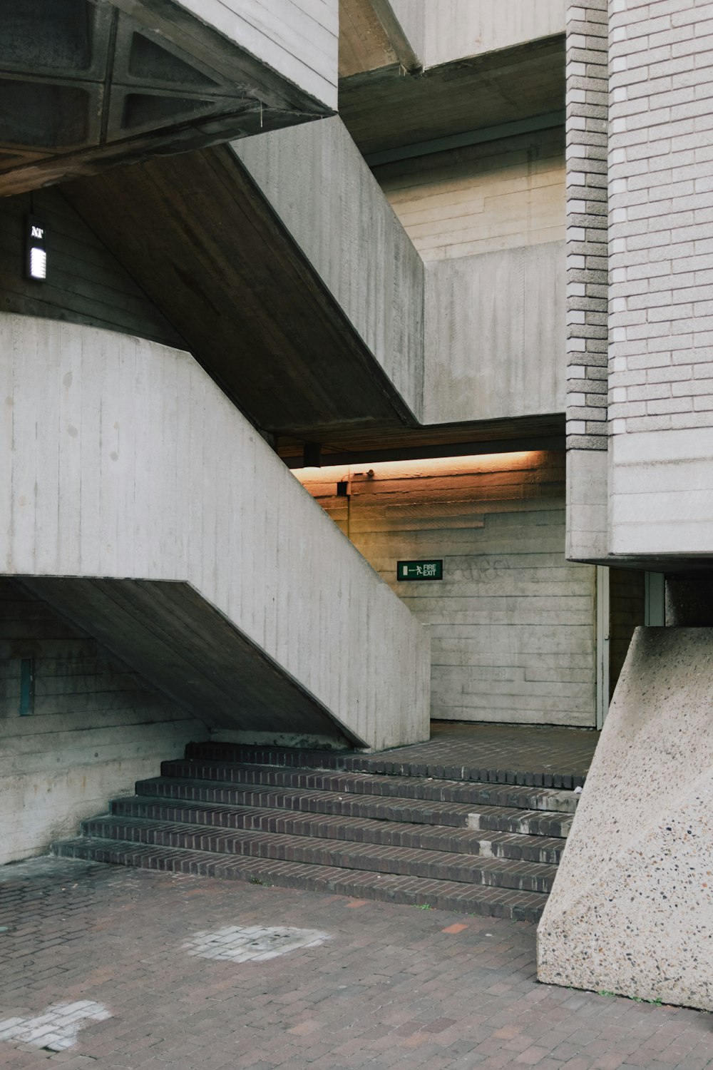 a concrete staircase with a sign