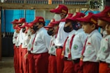 a group of people in red and white uniforms
