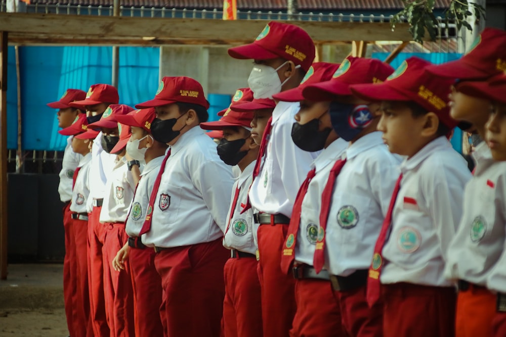 a group of people in red and white uniforms