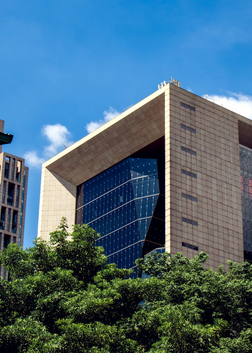 a tall building with glass windows