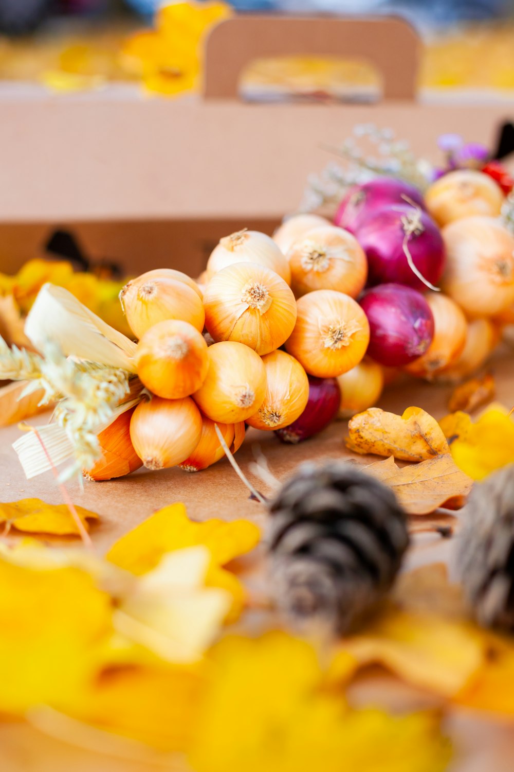 a box of colorful onions