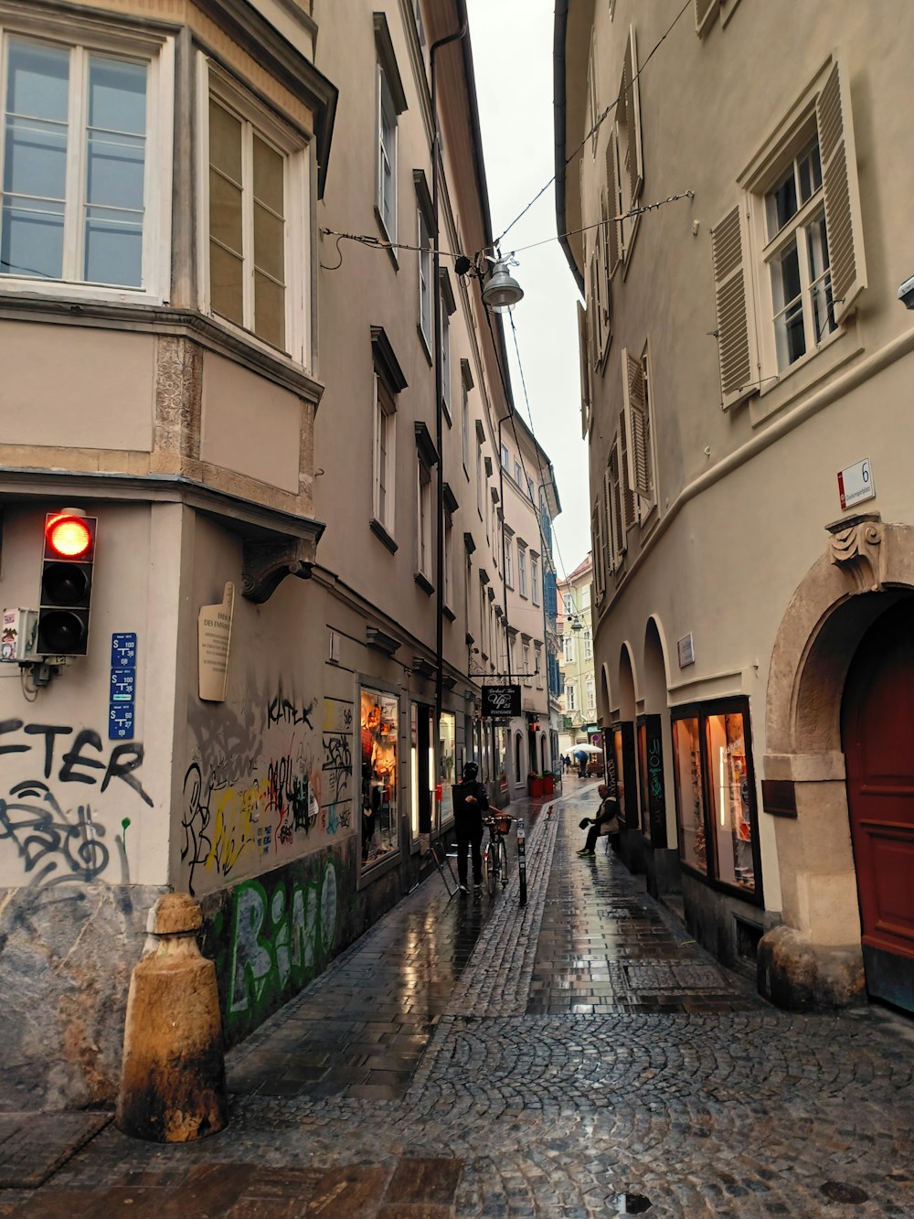 a street with graffiti on it