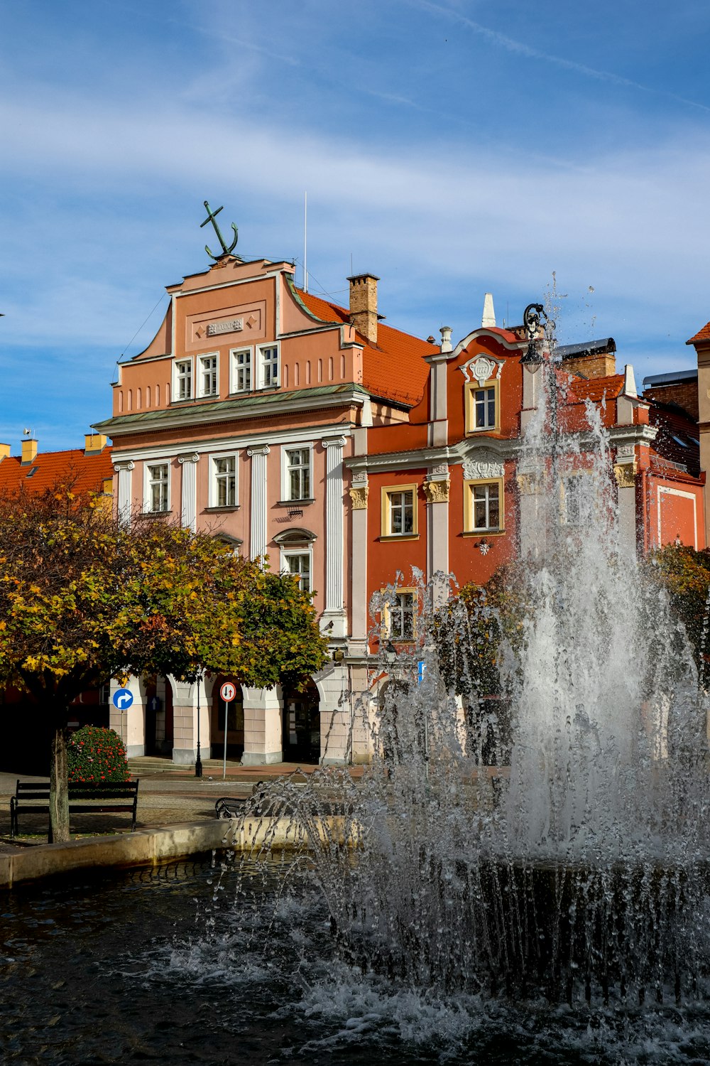 a fountain in front of a building