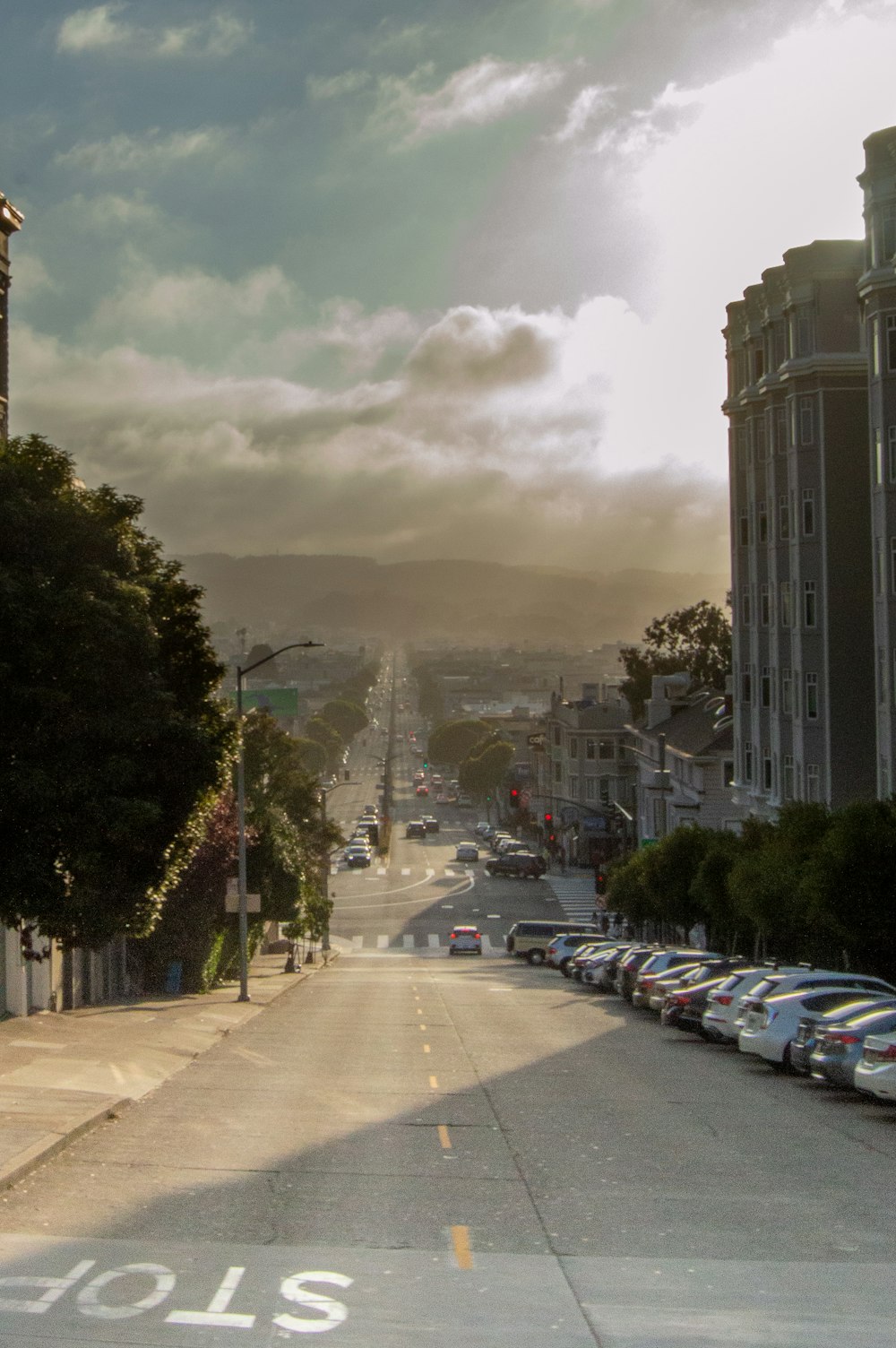 a street with cars parked along it