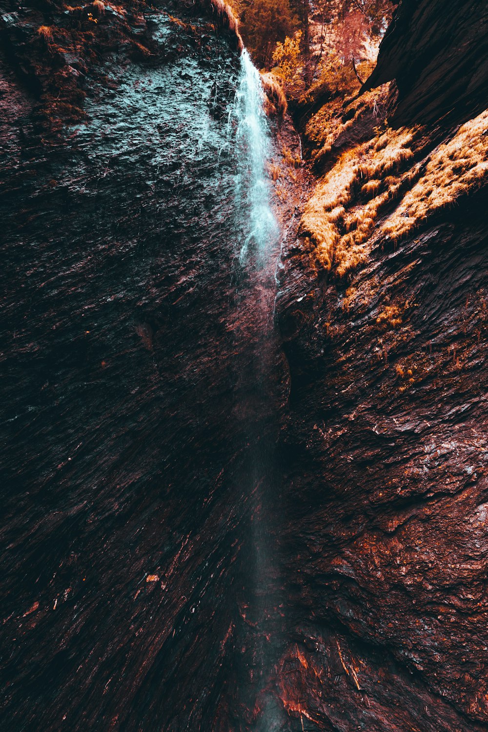 a waterfall in a canyon