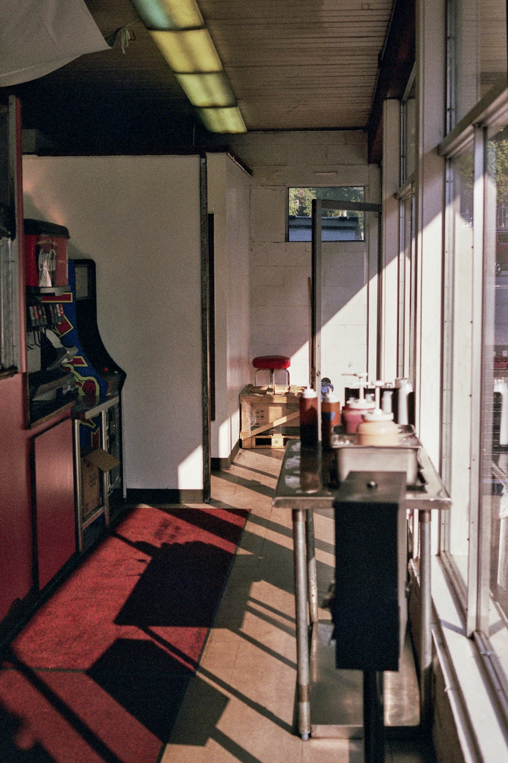 a room with a table and a rug