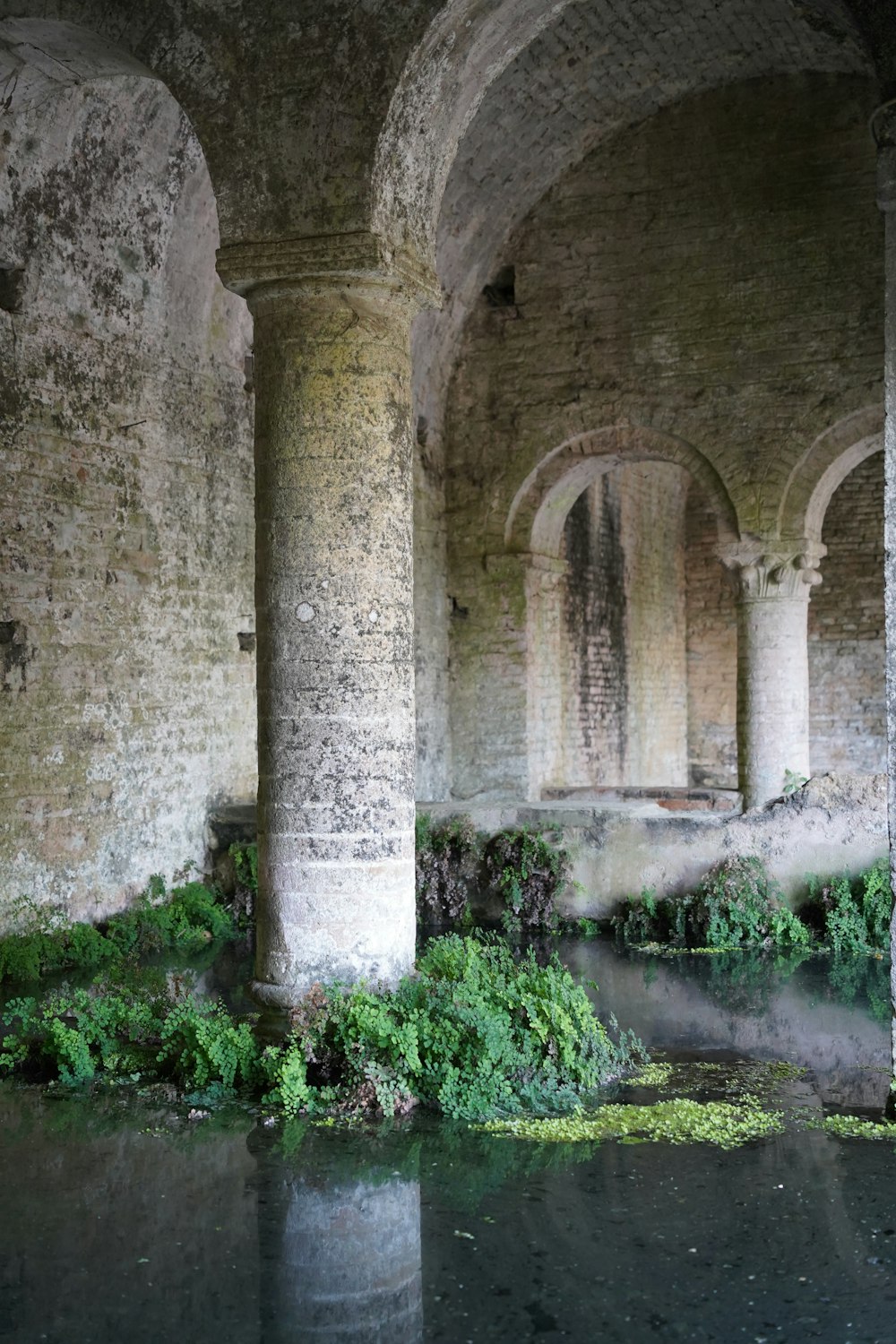 a stone building with pillars