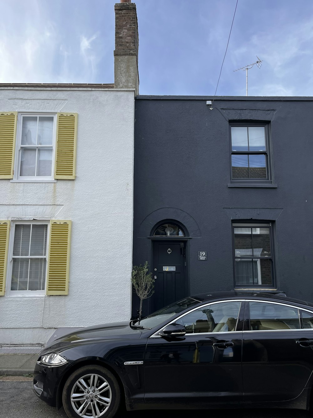 a car parked in front of a building