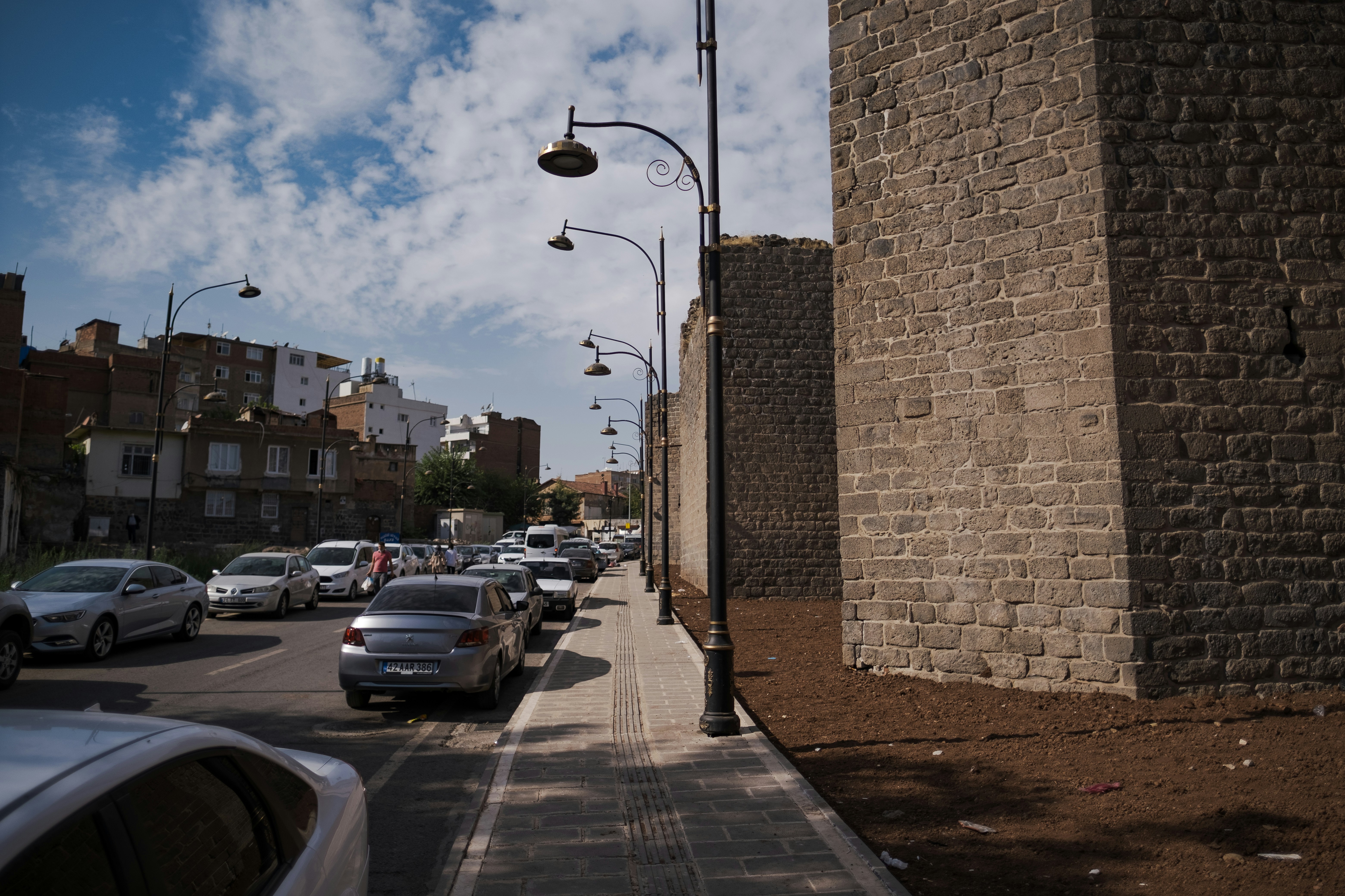 a street with cars parked along it