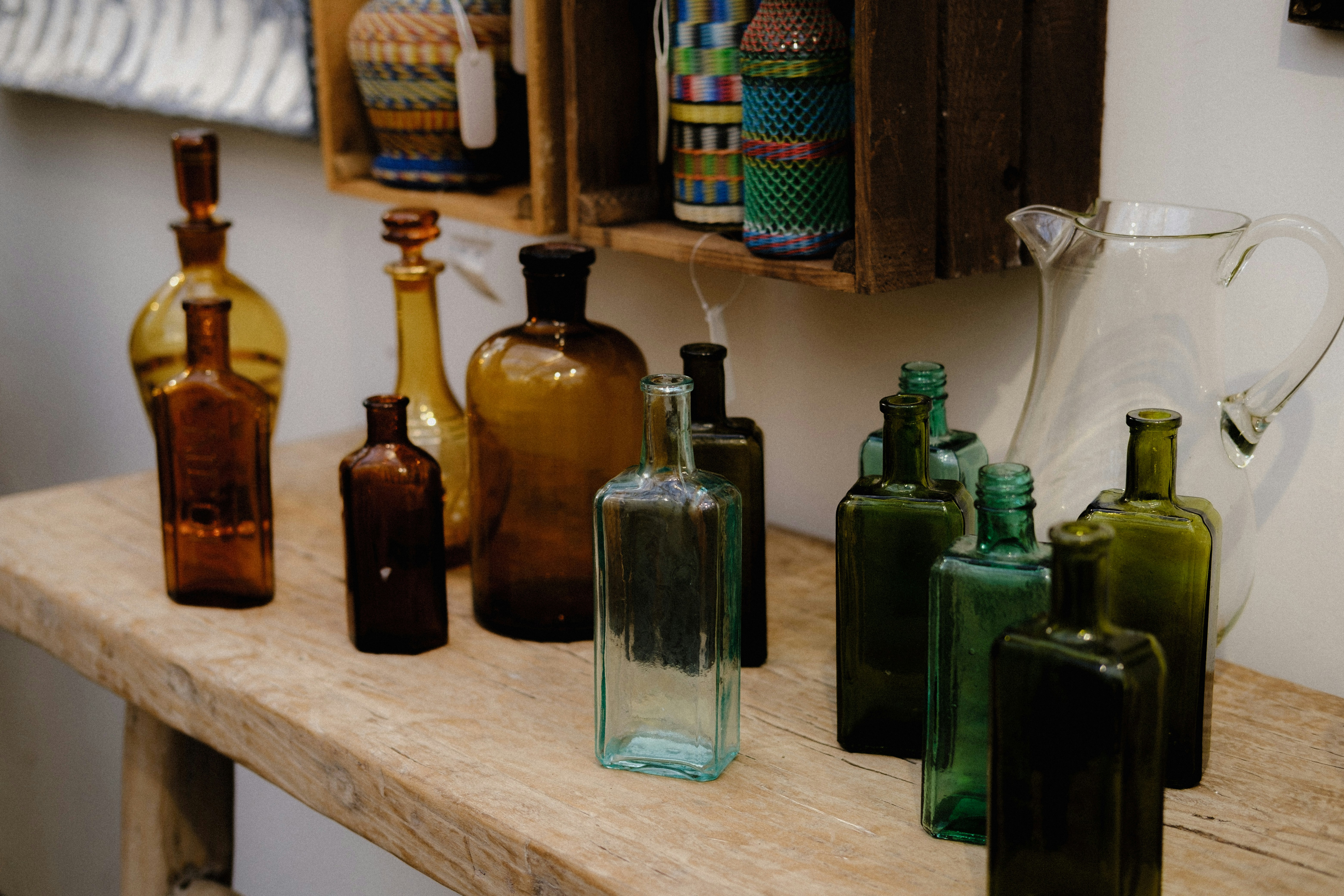 Glass bottles on table