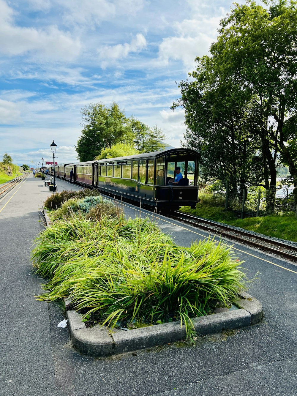 a train travels down the tracks