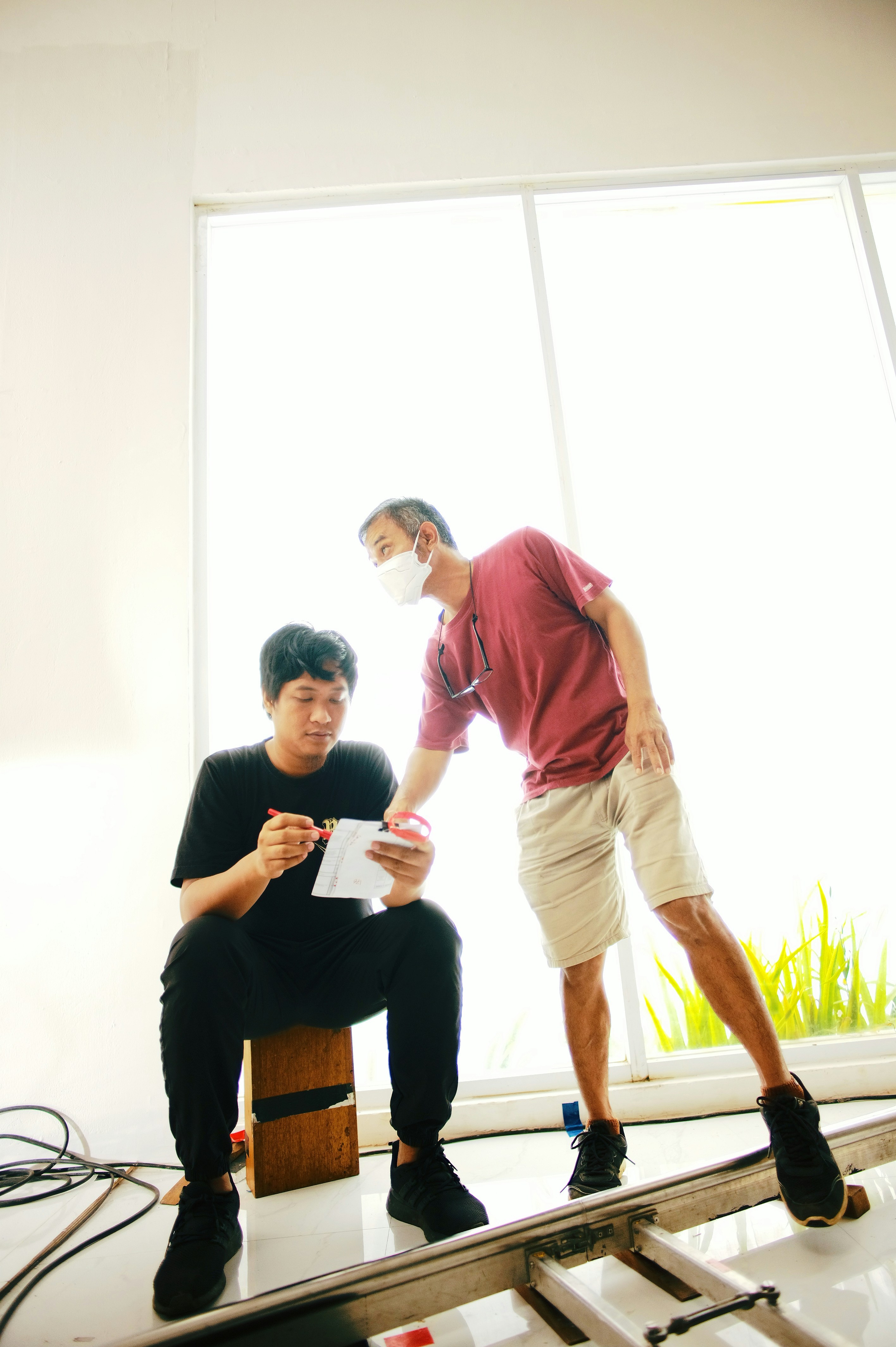 woman wearing yellow long-sleeved dress under white clouds and blue sky during daytime
