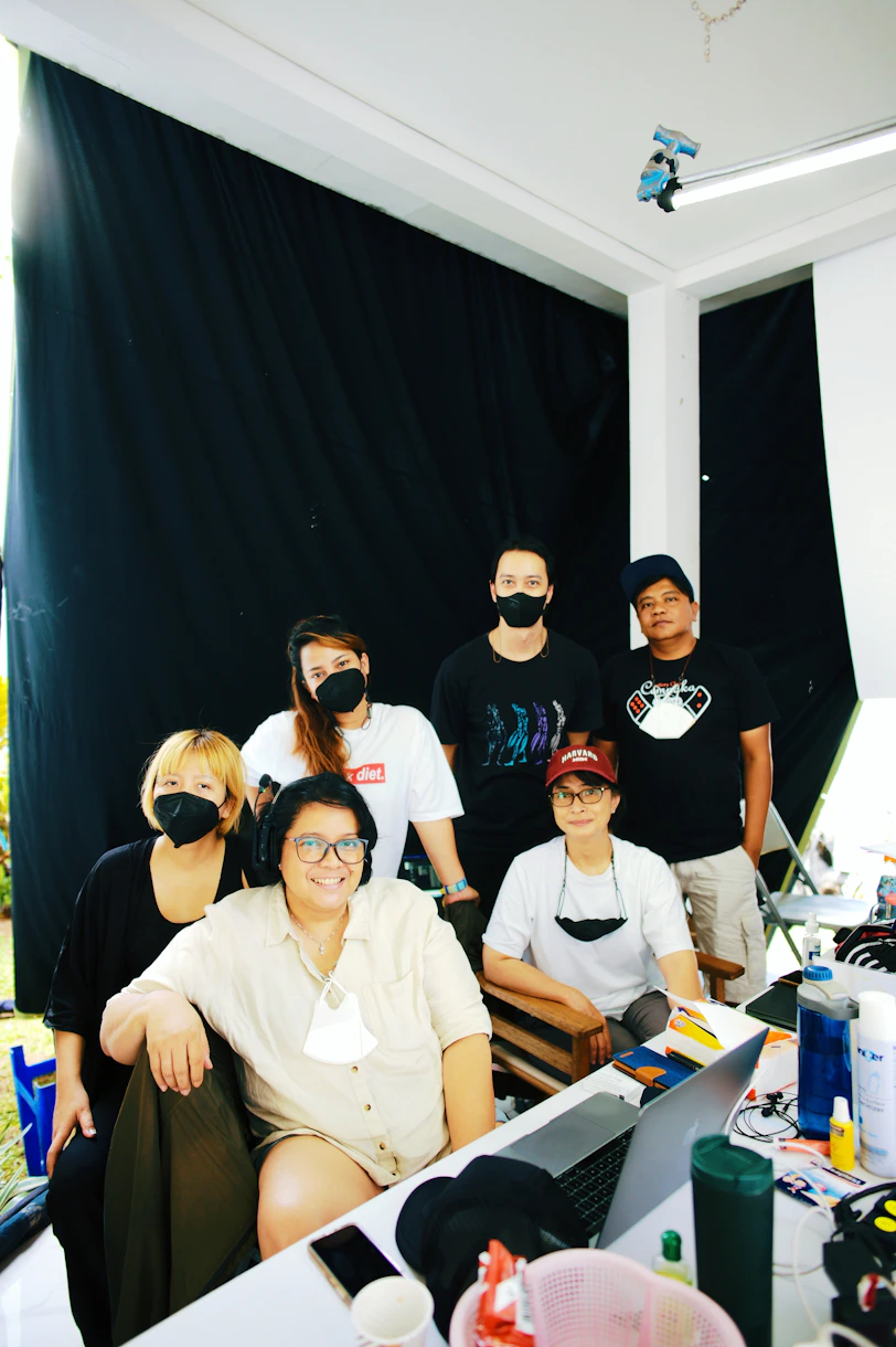 a group of people wearing masks