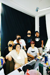 a group of people wearing masks