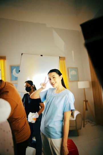 a person holding a white board