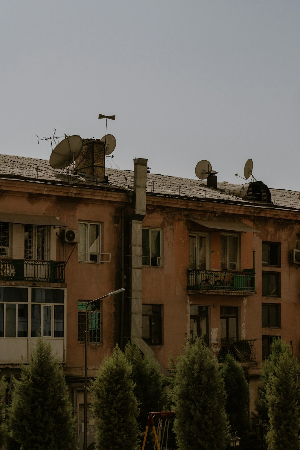 a building with trees in front of it