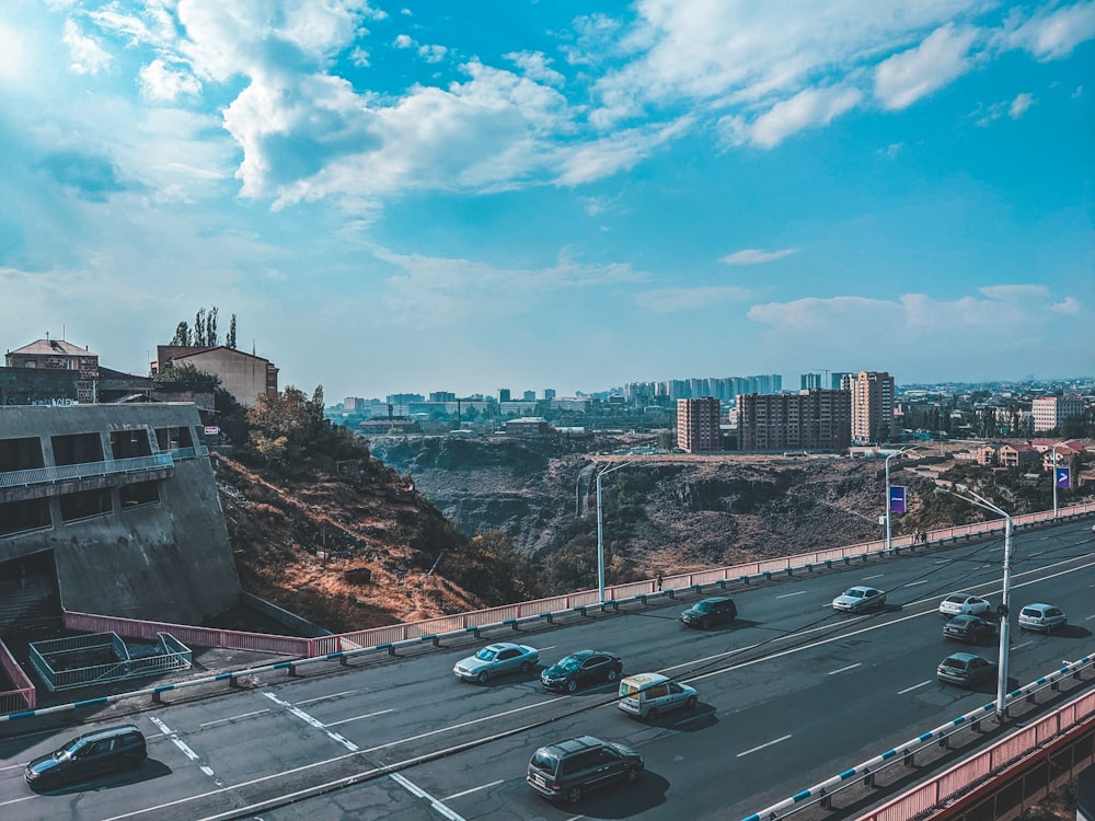 a city with cars and buildings