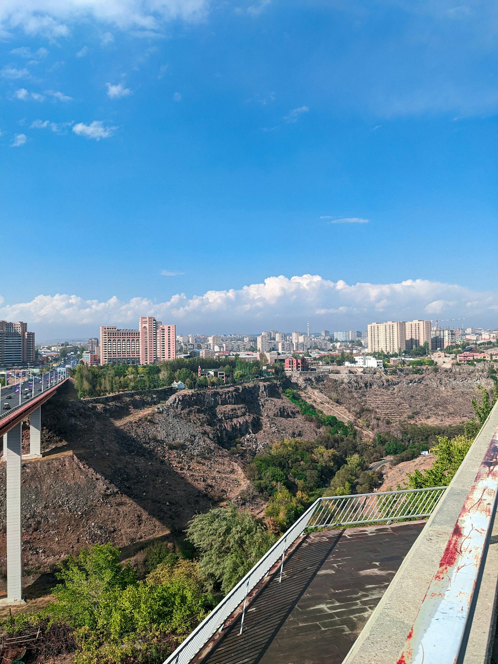 a city landscape with a bridge