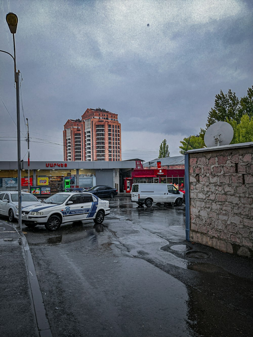 a group of cars parked in a parking lot