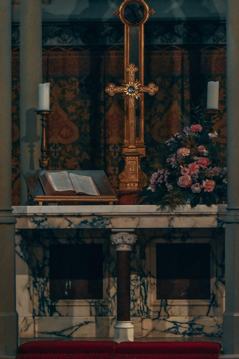 a religious shrine with flowers