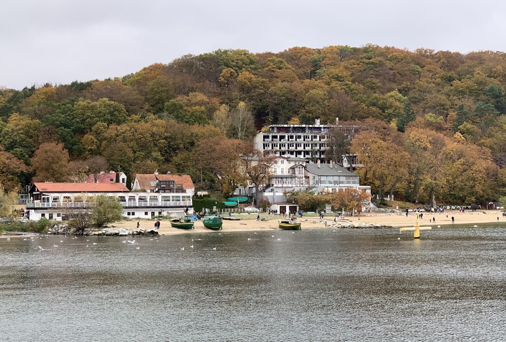 a body of water with boats and buildings by it