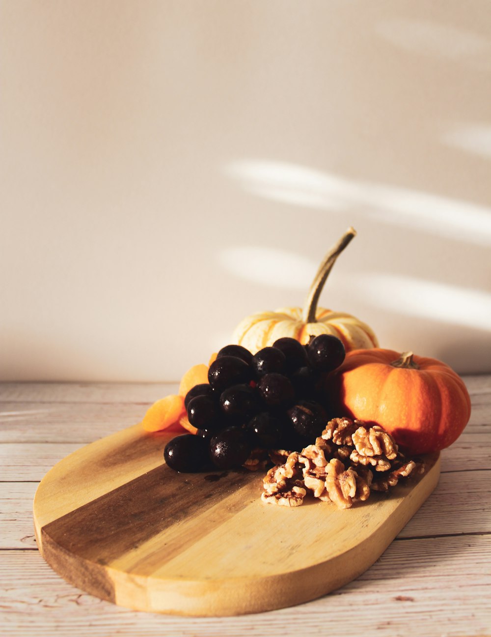 a fruit on a cutting board