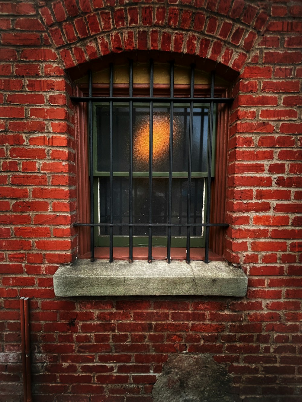 a window in a brick building