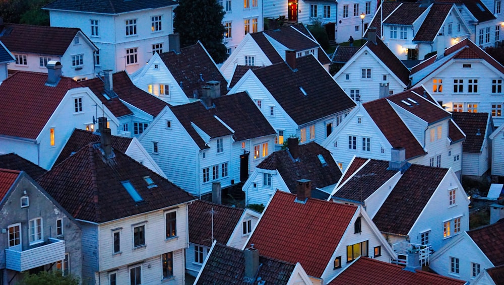 a group of buildings with red roofs