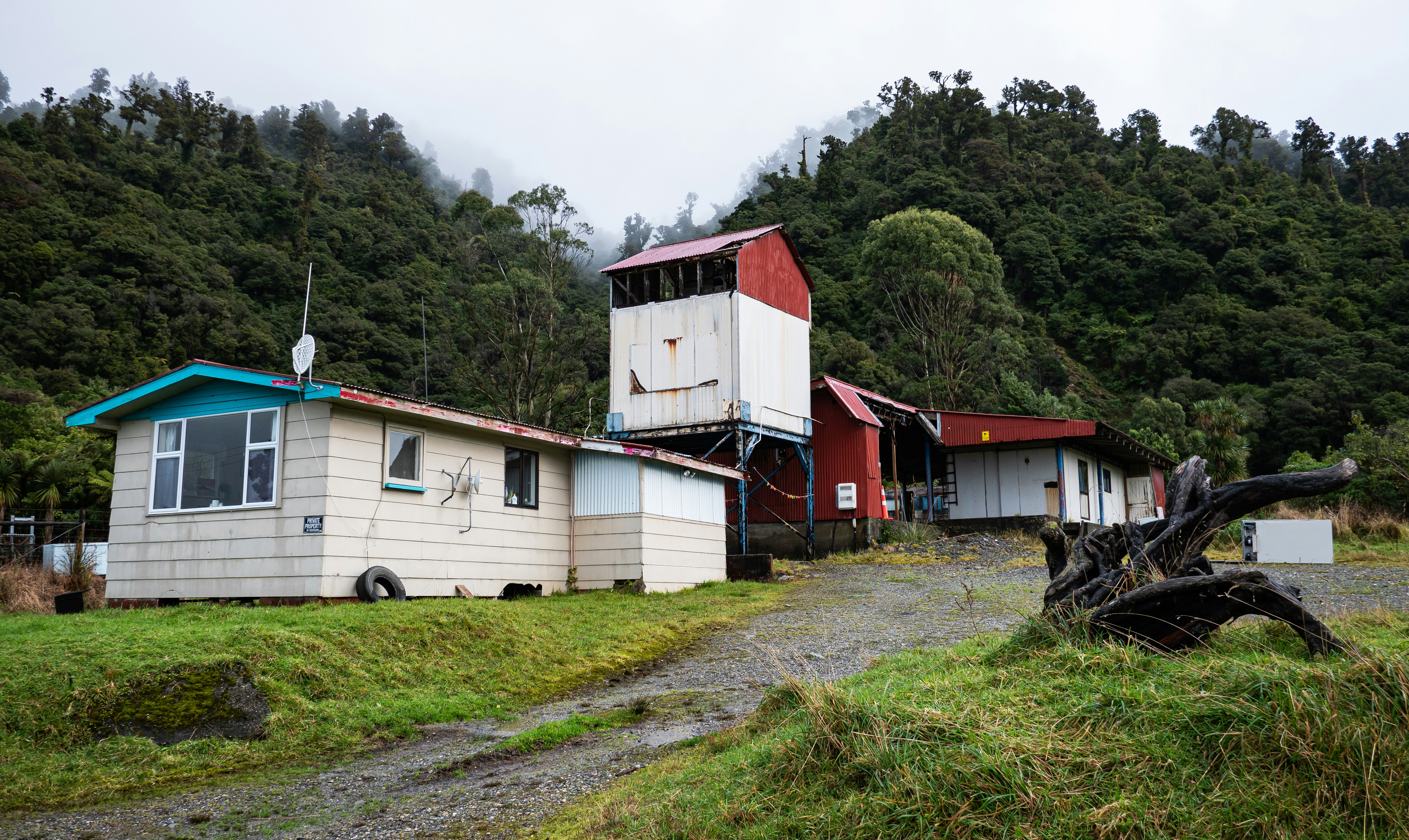 a white house with a red roof