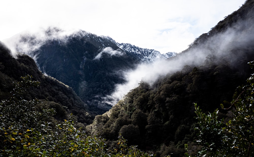 a mountain with clouds