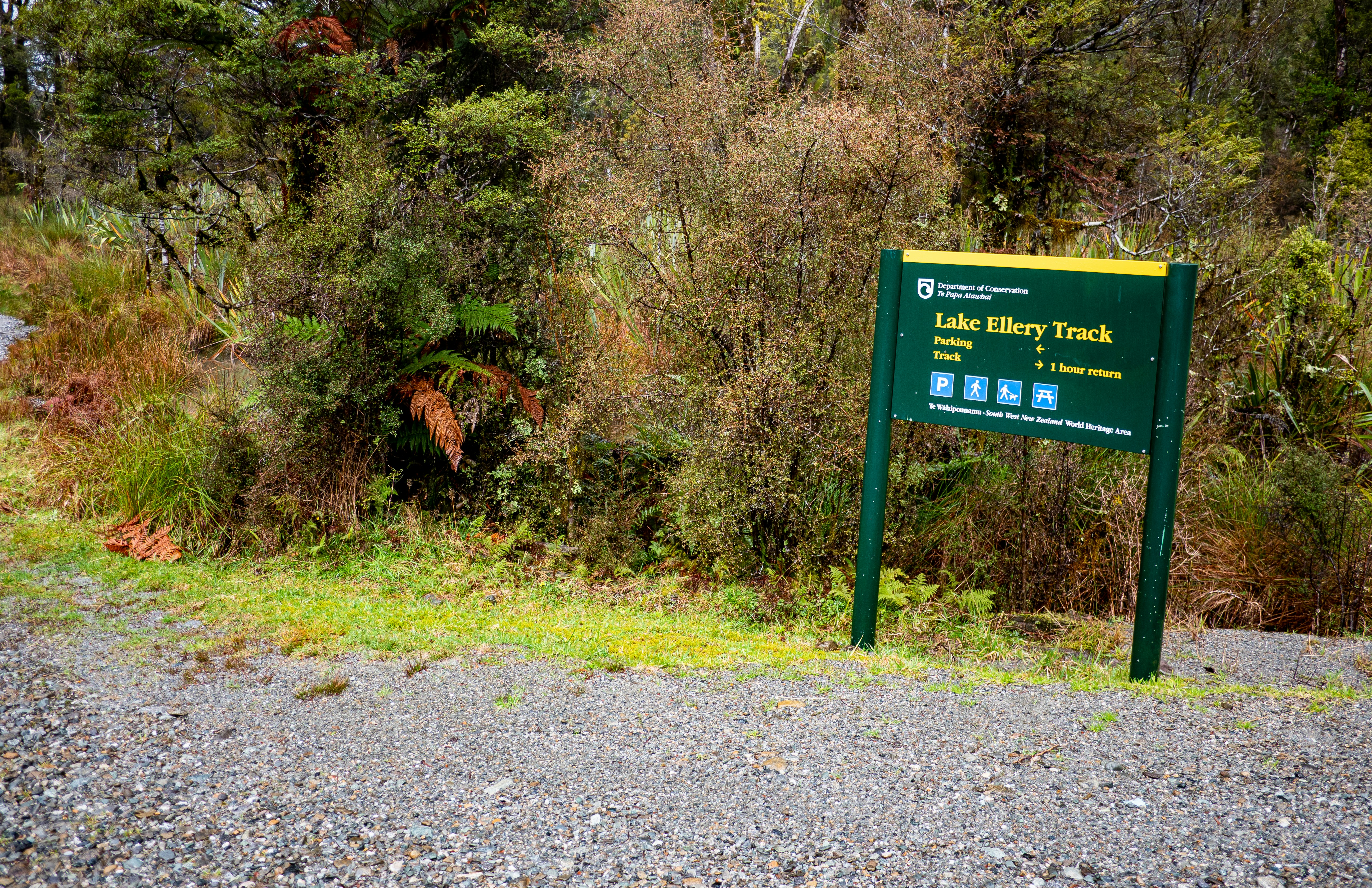 a sign on the side of a road