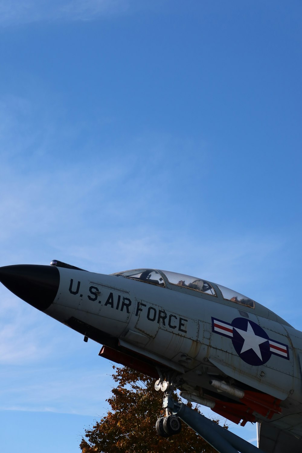 a fighter jet flying in the sky