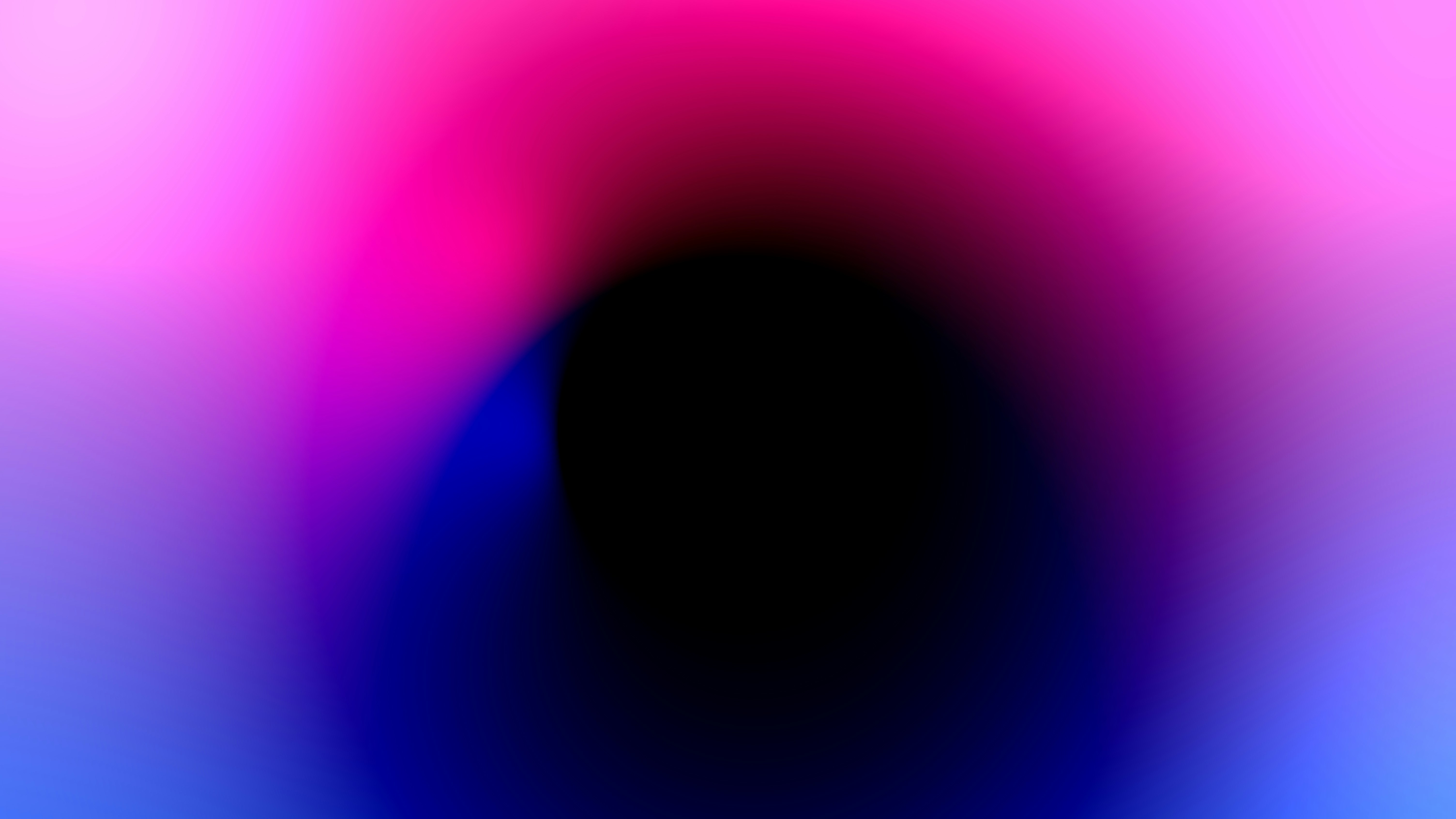 a black circle with a red center